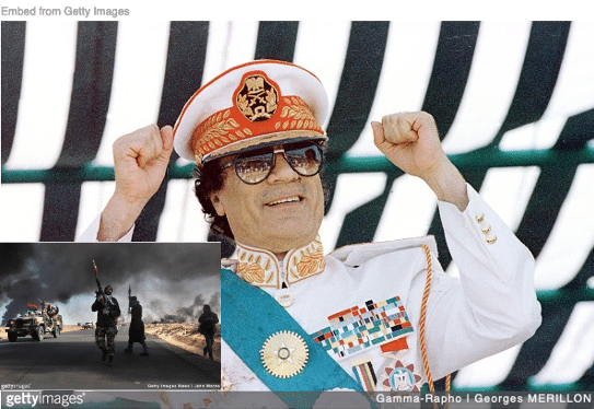 Muammar Gaddafi sitting triumphantly in full military uniform with scene of war raging inset