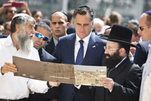 U.S. Republican presidential candidate Romney stands with Rabbi Rabinovitz during his visit at the Western Wall in Jerusalem