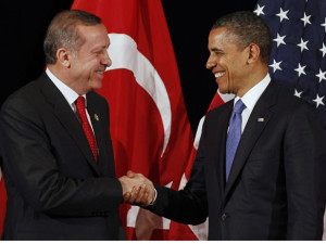 U.S. President Obama shakes hands with Turkey's PM Erdogan after a bilateral meeting in Seoul