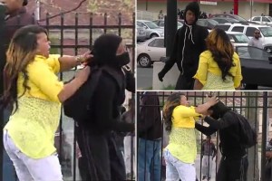 Mum-beats-child-for-throwing-rocks-at-Baltimore-Police-main