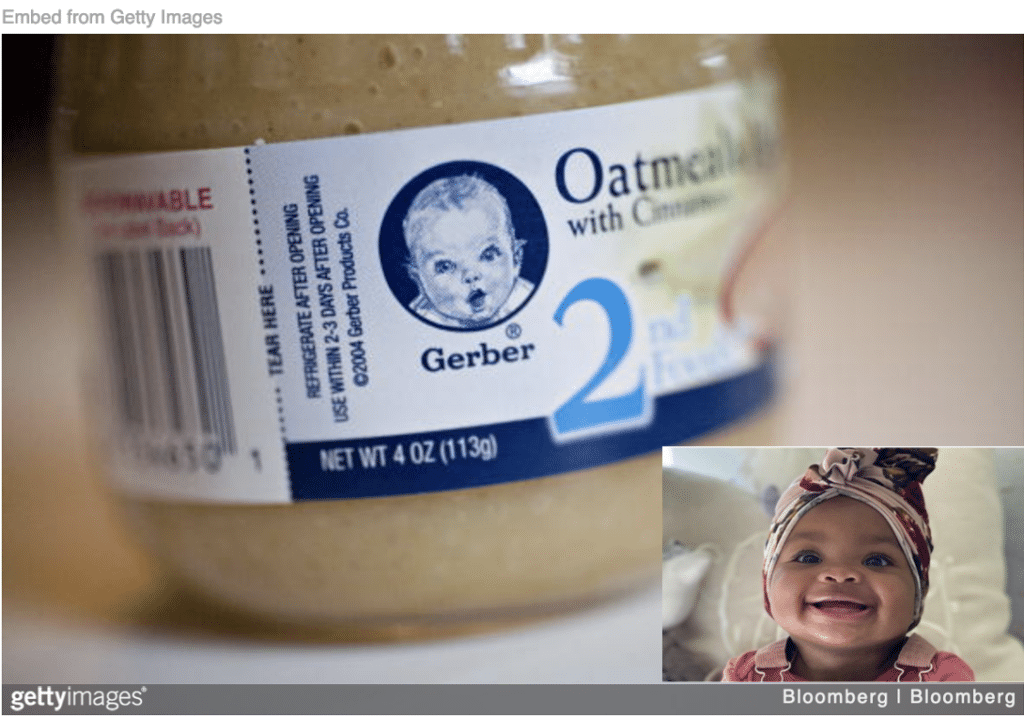 Traditional White Gerber baby on bottle with image of the new adopted Black Gerber baby inset. 