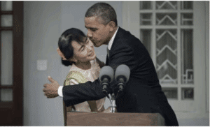 Obama awkwardly kissing embracing Aung San Suu Kyi