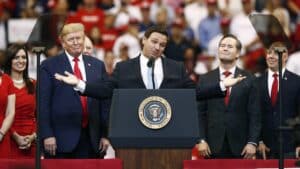 desantis upstaging trump literally on stage with a shrug