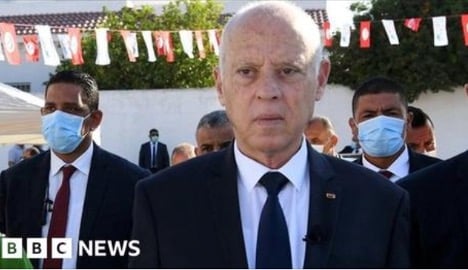 Tunisian president saied flanked by bodyguards