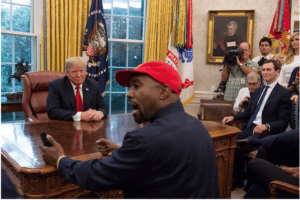 kanye in the white house oval wearing maga hat with kushner and trump looking on