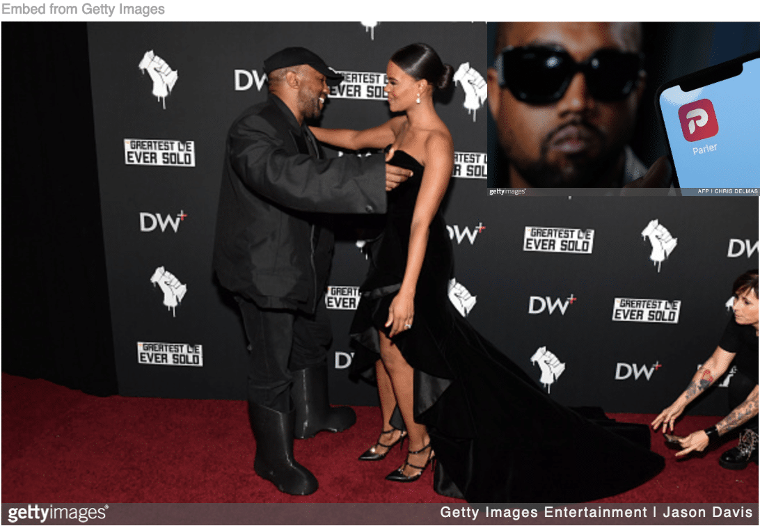 Kanye greeting Candace Owens on red carpet with image of Kanye and Parler app.