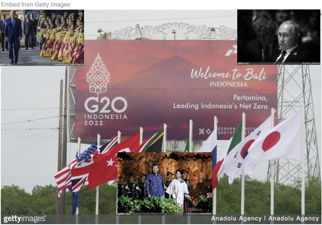 G20 welcome billboard with images of Biden, Xi, and Putin inset.