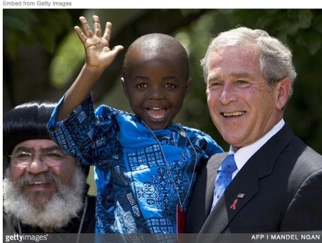 George W. Bush holding pepfar baby