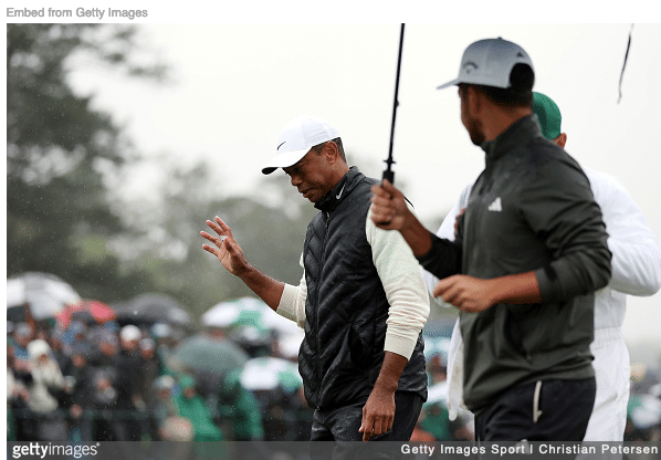 Tiger Woods waving to fans at The Masters before withdrawing