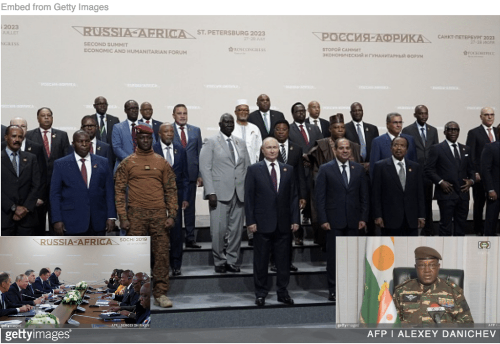 Class photo for Russia-Africa Summit in St. Petersburg with Putin meeting with African leaders and Niger general announcing coup inset.