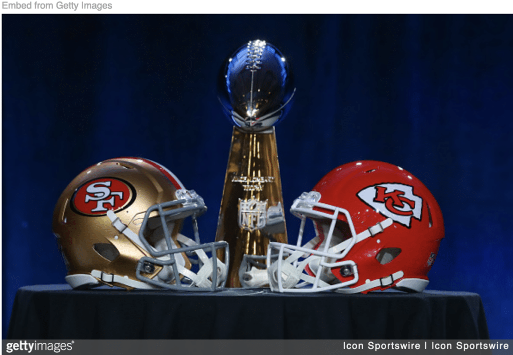 helmets of 49ers and Chiefs with Super Bowl trophy between them