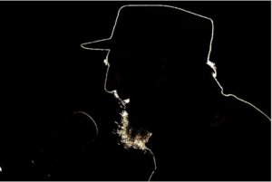 Fidel Castro speaking in silhouette